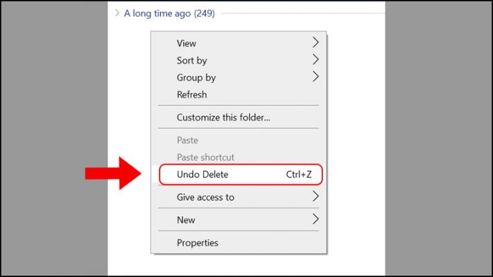 Dùng Ctrl + Z để khôi phục file vừa xóa.